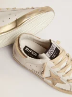 Golden Goose Women's Super-Star with gold sparkle foxing and metal stud lettering | ggoose.org